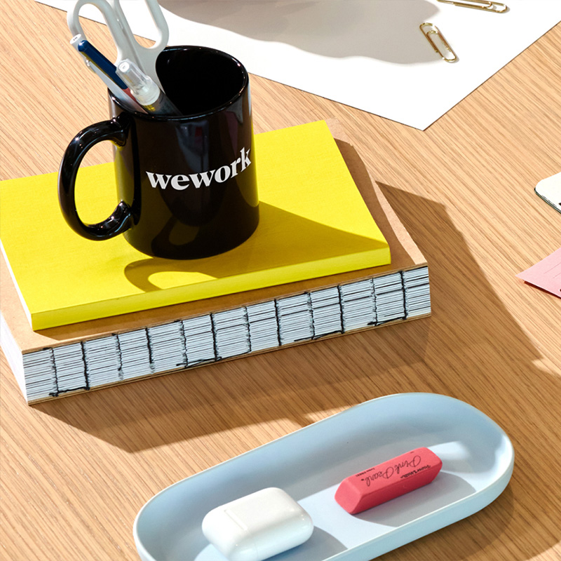 WeWork mug and office details